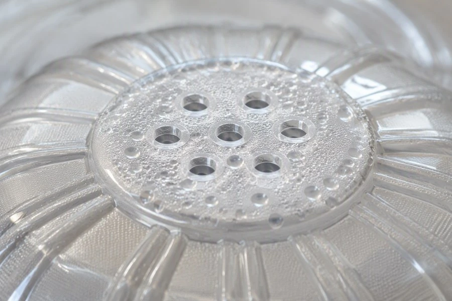 info-1-1 close-up of vent hole pattern on domed clear plastic lid